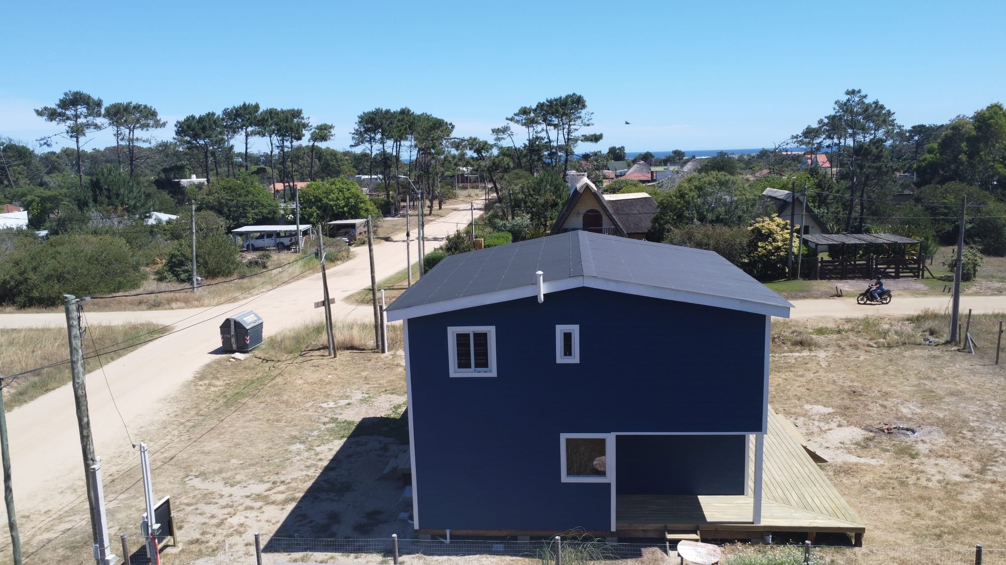 Site context with faint ocean