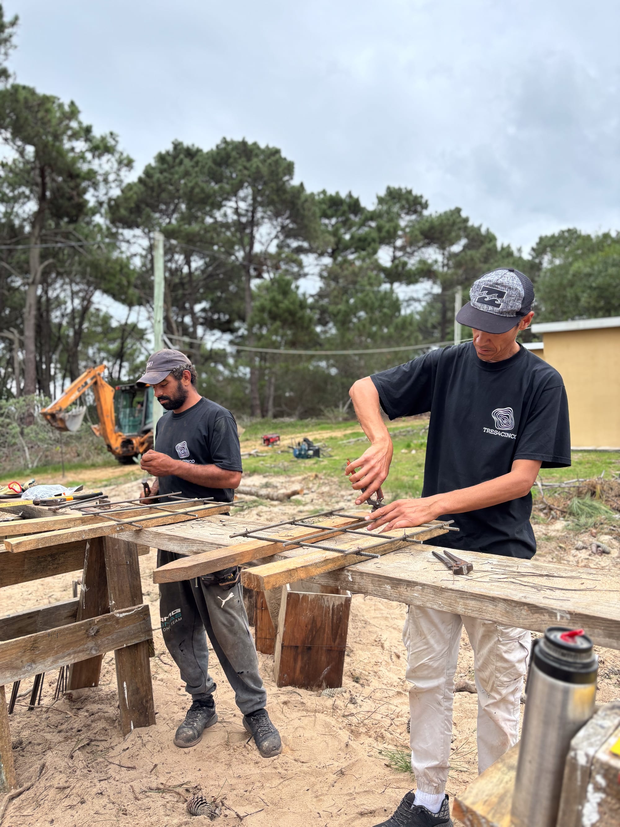 TRES4CINCO crew at work between the pines